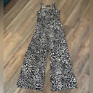 NWT Bebe wide leg romper with side cut out